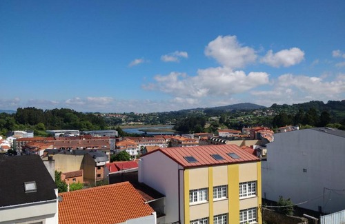 Mino Apartment | Central Miño Penthouse with Scenic Sea Views & Family-Friendly
