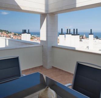 Luanco Apartment | Stylish Ático Nautilus II with Spacious Terrace & Pet Friendly