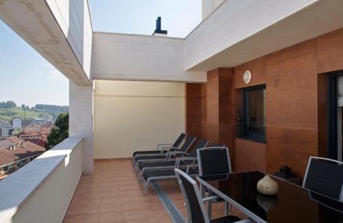 Luanco Apartment | Stylish Ático Nautilus II with Spacious Terrace & Pet Friendly