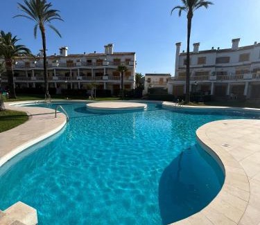 Almadrava Beach Apartment | Beachfront Retreat with Pool Access in Denia