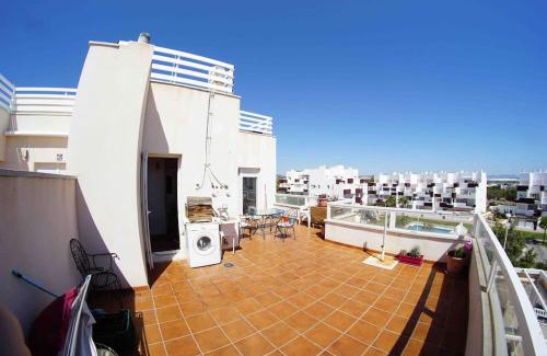 Retamar Apartment | Pet-Friendly Ático with Terrace in El Toyo - Family Fun Awaits