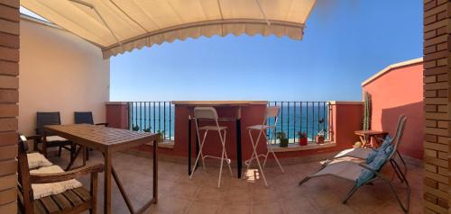 Adra Apartment | Duplex Retreat with Beachfront Views and Family-Friendly Amenities