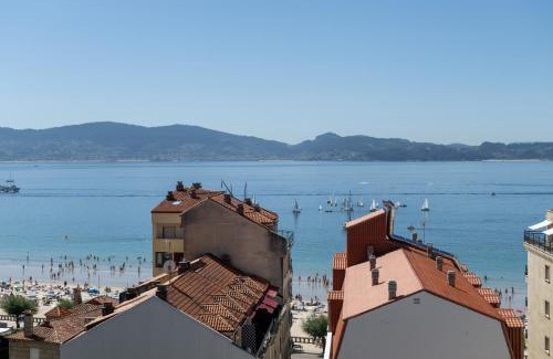 Sanxenxo Apartment | Oceanfront ÁTICO DE LUX SANXENXO - Rated 9/10 by Guests