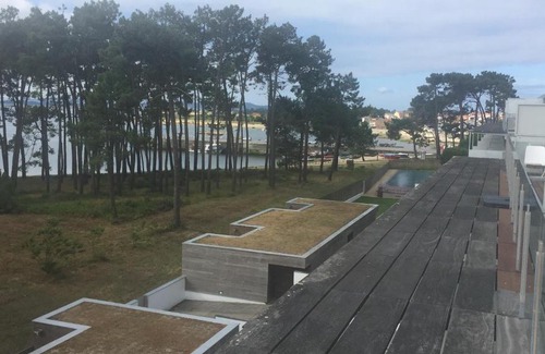 Isla de Arosa Apartment | Beachfront Retreat: Pool, Hot Tub & Ocean Views Await