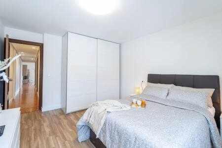 Gijon-Este Apartment | Inviting Ático with Terrace near Beach and Fútbol Events