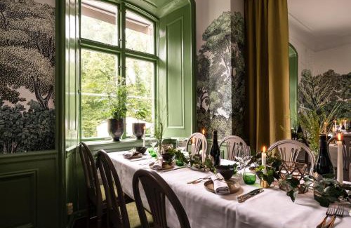 Bromma Hotel | Experience Åkeshofs Slott: Pet-Friendly with Hot Tub Bliss
