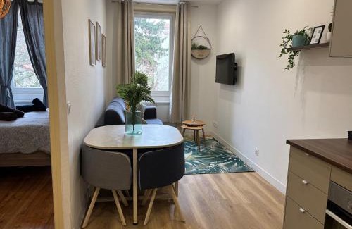 Bron Apartment | Elegant T2 in Bron with Private Parking & Top Ratings
