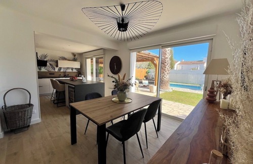 Lattes Villa | Elegant Villa with Pool Steps from the Beach
