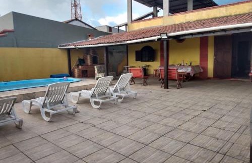 Tamoios House | Oceanfront Haven: Family-Friendly with Pool & Ocean Views