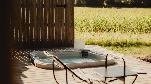 Dalhem Ski Chalet | Oceanfront Retreat at Ô NaNo Glamping with Spa & Hot Tub