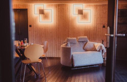 Dalhem Ski Chalet | Oceanfront Retreat at Ô NaNo Glamping with Spa & Hot Tub