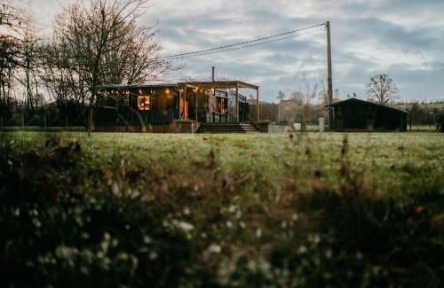 Dalhem Ski Chalet | Oceanfront Retreat at Ô NaNo Glamping with Spa & Hot Tub