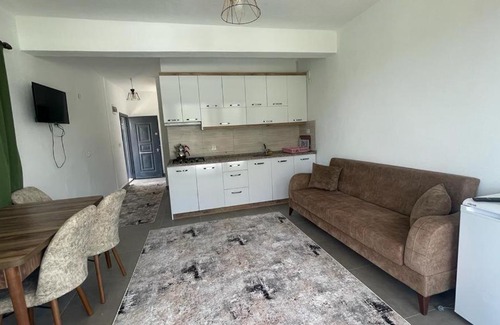 Adrasan Apartment | Öz Akdeniz Apart: Oceanfront Bliss with Private Beach Access