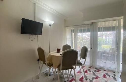 Lara Apartment | Garden Level Retreat with Private Beach Access