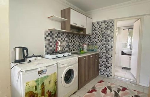 Lara Apartment | Garden Level Retreat with Private Beach Access