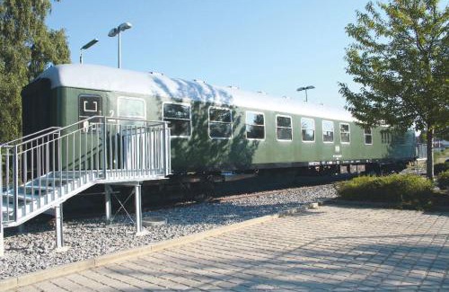 Bogen Apartment | Experience Nostalgic Stay in a Unique Train Car Hotel
