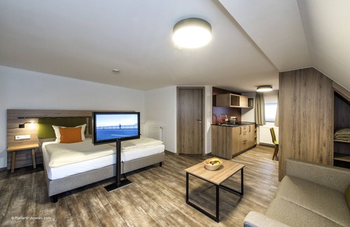 Nordwestliche Außenstadt Hotel | Experience Comfort at Übernachten in der Tenne