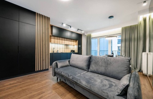 Lodz Apartment | Modern Łódź Prestige Suites with Parking & Family Amenities