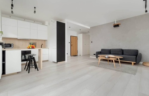 Lodz Apartment | Modern 1-Bedroom Retreat with Balcony & Pet-Friendly Perks