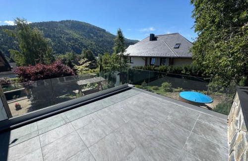Meszna Villa | Relaxing Getaway at Świstakówka with Hot Tub & Kitchen