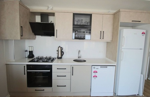 Mentese Apartment | Convenient City View Apartment Steps from Shopping Center