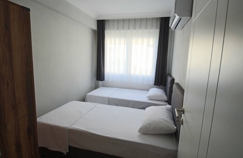 Mentese Apartment | Convenient City View Apartment Steps from Shopping Center