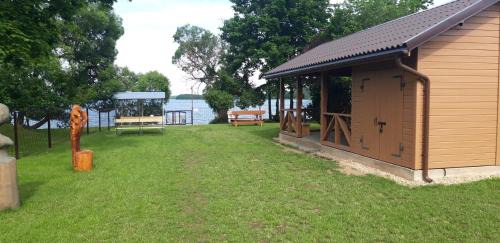 Paluse Apartment | Idyllic Žvejo krantas Palūšė with Private Beach Access