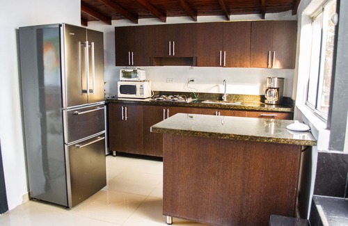 Zona Rosa Apartment | Unforgettable Rooftop Apartment with Pool at Llieras Park
