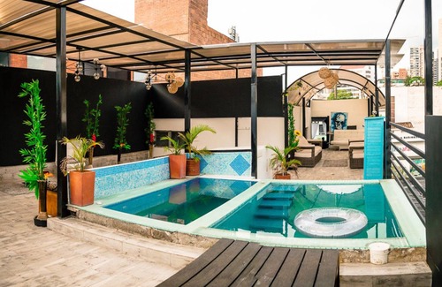 Zona Rosa Apartment | Unforgettable Rooftop Apartment with Pool at Llieras Park