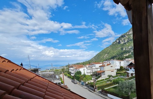 Kamena Vourla Apartment | Renovated Loft with Sea and Mountain Views, Steps from Beach