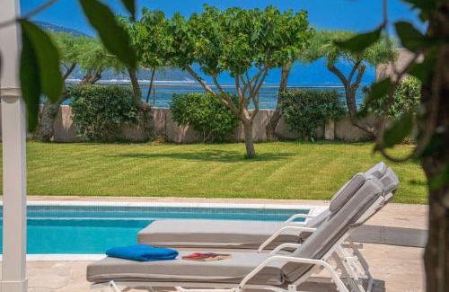 Sami Villa | Impressive Theano Villa: Oceanfront Stay with Pool & Views