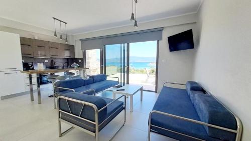 Aristotelis Apartment | Explore Υπόσκαφα Cave Concept: Oceanfront Oasis Awaits