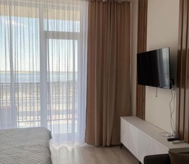 Aktau Apartment | Discover Актау Ревьера: Family-Friendly with Pool Access