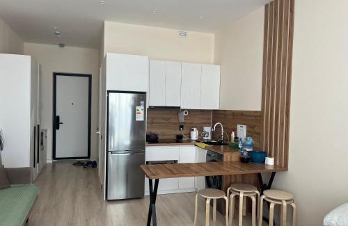 Aktau Apartment | Discover Актау Ревьера: Family-Friendly with Pool Access