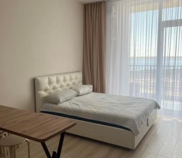 Aktau Apartment | Discover Актау Ревьера: Family-Friendly with Pool Access