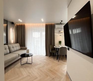 Podil Apartment | Elegant VIP Apartments with Theater Views - HELEN Network