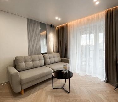 Podil Apartment | Elegant VIP Apartments with Theater Views - HELEN Network