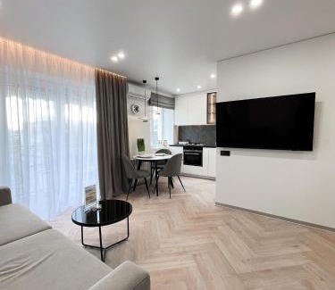 Podil Apartment | Elegant VIP Apartments with Theater Views - HELEN Network