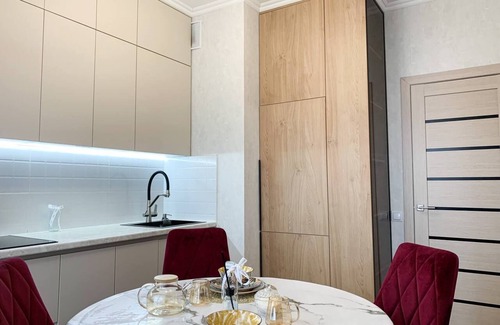 Nur-Sultan Apartment | Modern Apartments with Cultural Touches for Family Stays