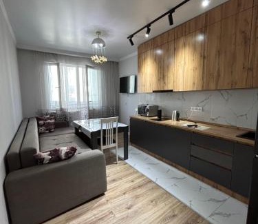 Tuzdybastau Apartment | Convenient Apartment Near the Airport for Families