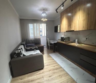 Tuzdybastau Apartment | Convenient Apartment Near the Airport for Families