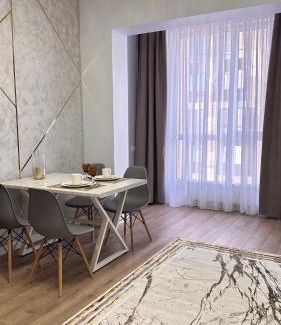 Almaty Apartment | Comfortable Atmosphere: Guest Rated 10/10 with Great Amenities