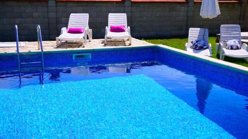 Rusalka Villa | Villa Delfin: Oceanfront Retreat with Pool & Pet Friendly
