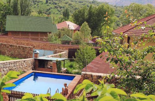 Uzbekistan Resort | Relax at Chimgan Apple Garden: Pool & Oceanfront Views