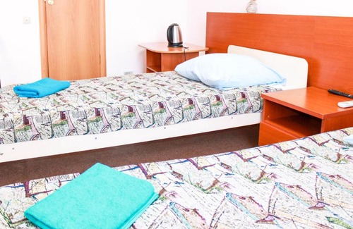 Surgut Hotel | Relax at ГОСТИНИЦА МАЯК: Family-Friendly & Pet Welcome