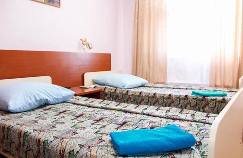 Surgut Hotel | Relax at ГОСТИНИЦА МАЯК: Family-Friendly & Pet Welcome