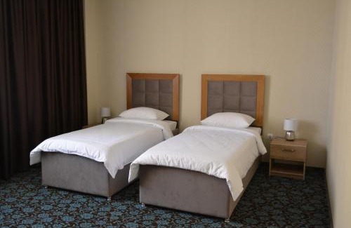 Aktobe Hotel | Discover Коктобе: 4-Star Oasis with Pool & Hot Tub