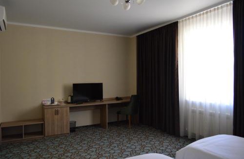 Aktobe Hotel | Discover Коктобе: 4-Star Oasis with Pool & Hot Tub