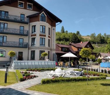 Slavske Hotel | Discover Два Леви: Rated 9.5/10 with Family-Friendly Dining