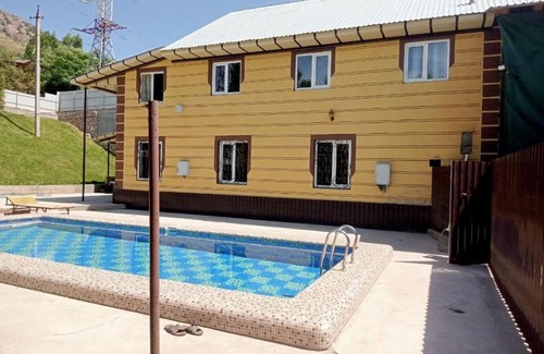 Uzbekistan House | Experience Дача Бахадыр: Family-Friendly Retreat with Pool